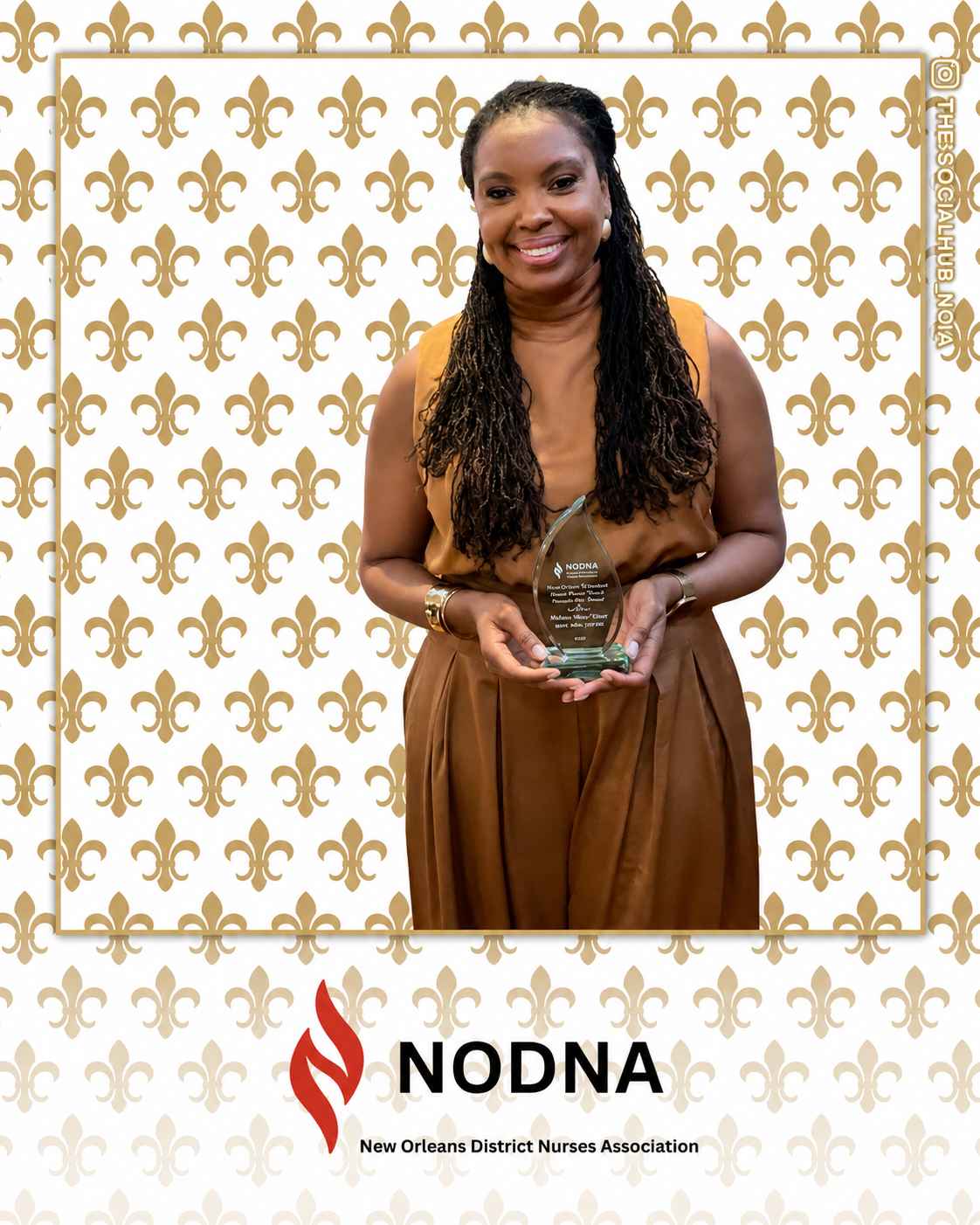 Nursing award recipient posing with her recognition award during the New Orleans District Nurses Association event, photographed by The Social Hub Nola.